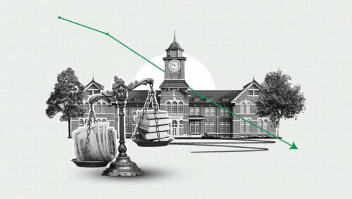 Building with downward arrow and scale in foreground